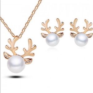 Reindeer earring and necklace lot in gold